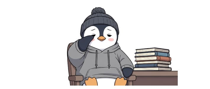 本を読んで目が疲れてしまったペンギンのキャラクター